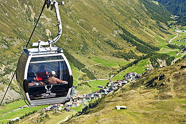 People in a passenger cabin above a valley, Obergurgl, Oetztal Alps, Tyrol, Austria, Europe