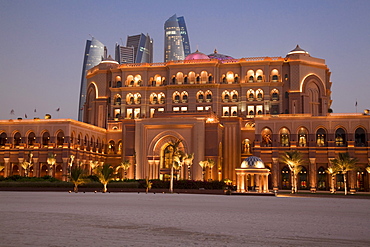 Emirates Palace hotel and high-rise buildings at dusk, Abu Dhabi, United Arab Emirates