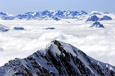 Snow covered mountains and sea of fog, Dolomites, Alto Adige, South Tyrol, Italy, Europe