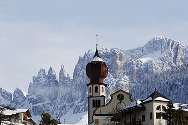 Steeple in Tiers, with the mount Rosengarten in the background, Dolomites, Alto Adige, South Tyrol, Italy