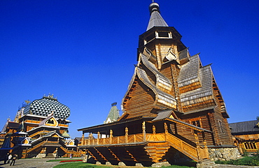 Wooden house under blue sky at Ismailowo Park, Moscow, Russia, Europe