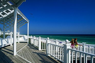 Girls going downstairs to the beach, Panama City Beach, Santa Rosa Island, Florida, USA, America