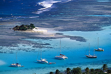 Aerial view of sailing boats off an uninhabited island, St. Vincent, Grenadines, Caribbean, America