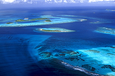 Aerial view of the archipelago Tobago Cays under clouded sky, Grenadines, Caribbean, America