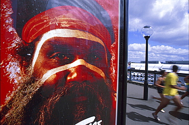 Billboard and joggers, Sydney, New South Wales, Australia