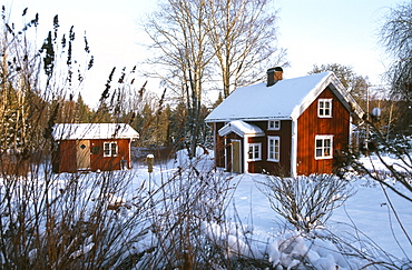 Sommer house in a winter landscape, South of Boras, Vastergotland, Sweden