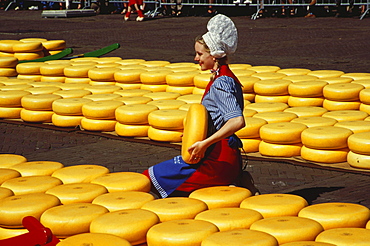 Woman in traditional clothes selling cheese, Cheese Market, Alkmaar, Netherlands