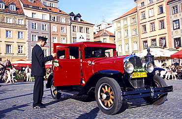 Red oltimer at old market square, Warsaw, Poland, Europe