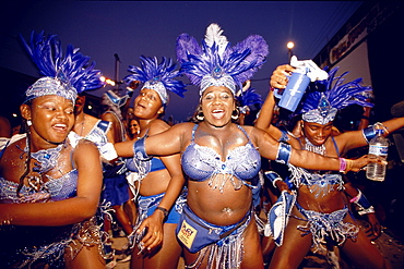 Women in costumes dancing at Mardi Gras, Port of Spain, Trinidad and Tobago, Caribbean