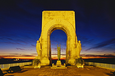 Illuminated gate in front of mediterranean sea in the evening, Marseille, Bouches du Rhone, Provence, France, Europe