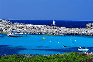 Boats in a bay at Cala Binibeca, Minorca, Spain