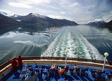 People sunbathing on a stern, Beagle Channel, South Chile, South America