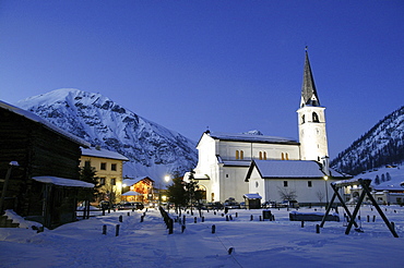 Saint Marys Church, Church Santa Maria, Mont dal Bon Curat in the background, Livigno, Italy