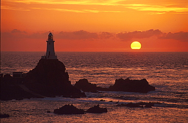 Corbiere Lighthouse at sunset, Jersey, Channel Islands, Great Britain