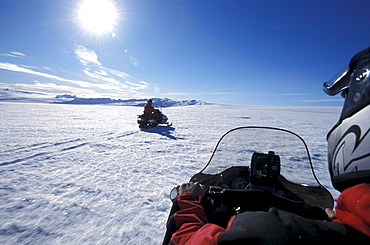 Snowmobiles on Brokarjoekull, a tongue of Vatnajoekull, Iceland