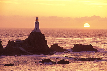 CorbiÃˆre lifghthouse at sunrise, Jersey, Channel Islands, Great Britain