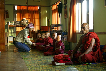 young monks sitting, Burma, Myanmar