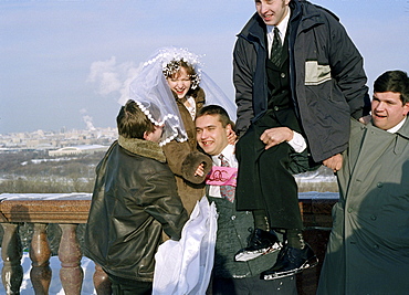 Friends making a joke with bride, Marriage, Sparrow Hills, Moscow, Russia