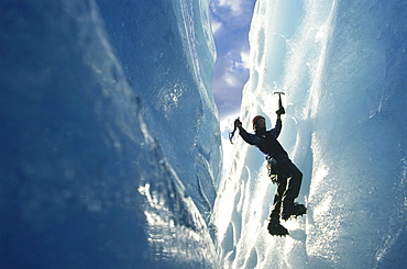 Person ice climbing at Briksdal Glacier, Norway