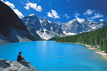 Woman enjoying the viewa at Moraine Lake, Ten Summits, Rocky Mountains, Alberta, Canada