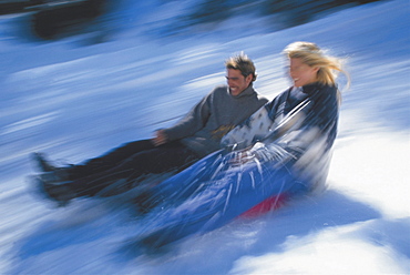 Couple sledging