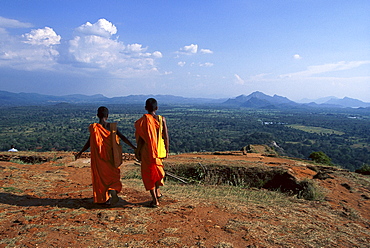 Two Monks on Sigiriya Rock, Lion's rock, an ancient rock fortress, Sigiriya, Sri Lanka