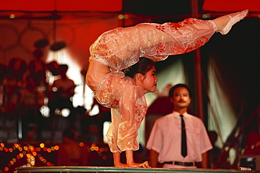 Acrobat at national circus, Saigon, Vietnam, Asia