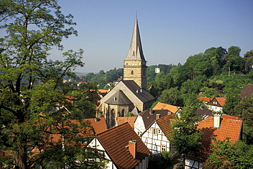 Half-timbered houses and church in the sunlight, Warburg, North Rhine-Westphalia, Germany