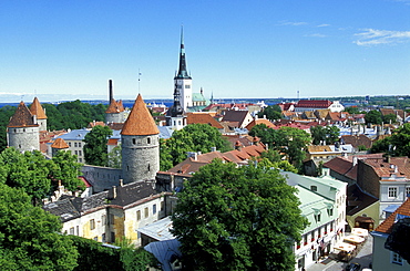 View over the old town of Tallinn from Rohukohtu terrace. The towers of the city walls in the front, St. Michael's Monastery and St. Olaf's Church in the back, Tallinn, Estonia