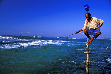 Stilt fisherman with fishing rod, Sri Lanka, Asia