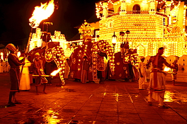 Kandy Perahera procession in front of Dalada Maligawa temple at night, Sri Lanka, Asia