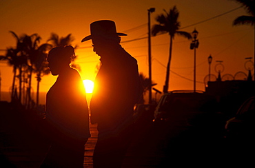 Older couple at sunset at Malecon, La Paz, California Sur, Baja California, Mexico