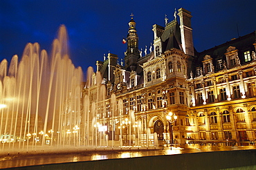 Hotel de Ville, illuminated town hall and fountain in the evening, Paris, France, Europe