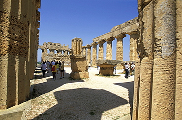 Tourists visiting ruins, Selinunte, Sicily, Italy, Europe