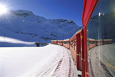 Rhaetische Bahn, railway in winter landscape, Engadin, Switzerland, Europe