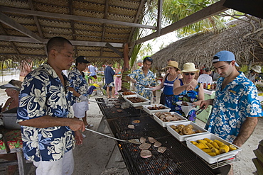 Beach barbeque lunch at a beach party for passengers of the cruiseship Star Flyer (Star Clippers Cruises), Fakarava, The Tuamotus, French Polynesia