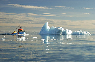 Fishing boat driving over the sea, Ilulissat, Greenland