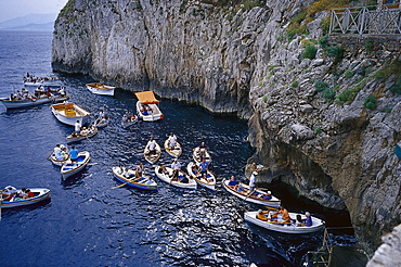 View at people on boats outside the blue grotto, Capri, Italy, Europe