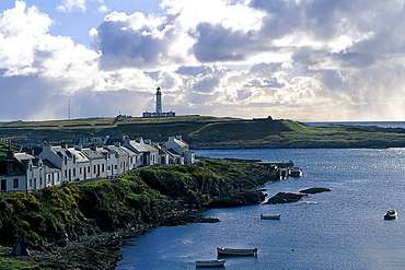 View across Portnahaven towards the lighthouse, Islay, Inner Hebrides, Scotland, Great Britain