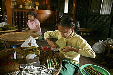 women and girls in cigar factory, Bago, Myanmar