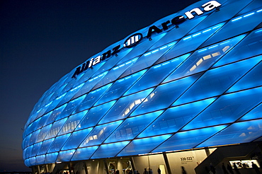 Colorful lit Allianz Arena football stadium at night, Munich, Bavaria, Germany