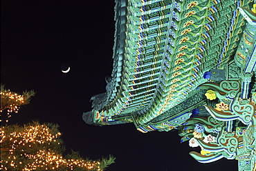 Illuminated temple roof at night, Daegu, South Korea, Asia