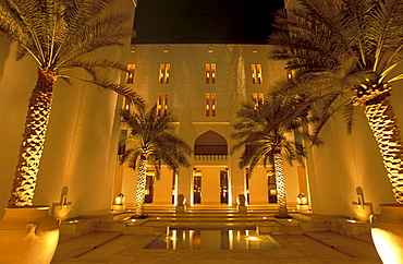 Illuminated atrium of the Chedi Hotel at night, Muscat, Oman