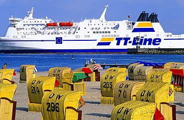 View over beach chairs on the beach at a ferry, Travemuende, Schleswig Holstein, Germany, Europe
