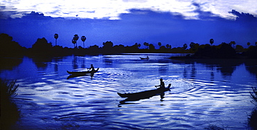 Fishermen on the Mekong river in the evening, Siem Reap Province, Cambodia, Asia