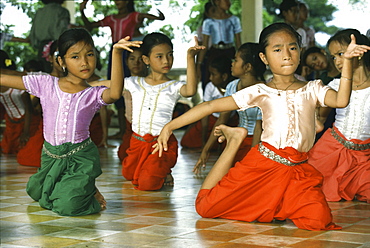 Girls learning temple dance at the Royal Academy of Performing, Phnom Penh, Cambodia, Asia