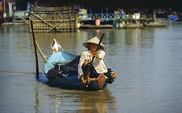 Woman in a boat on Tonle Sap lake, Siem Raep province, Cambodia, Asia