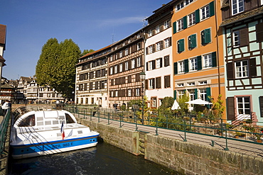 Excursion boat passing the district La Petit France, Excursion boat passing a lock in the district La Petit France Little France, Strasbourg, Alsace, France