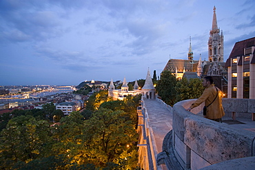 Fishermen's Bastion at Castle Hill, View along Fishermen's Bastion to Matthias Church at Castle Hill at night, Buda, Budapest, Hungary