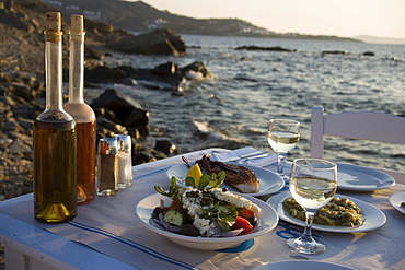 Different greek starters, including salat, served in the Sea Satin Market Restaurant, Mykonos-Town, Mykonos, Greece